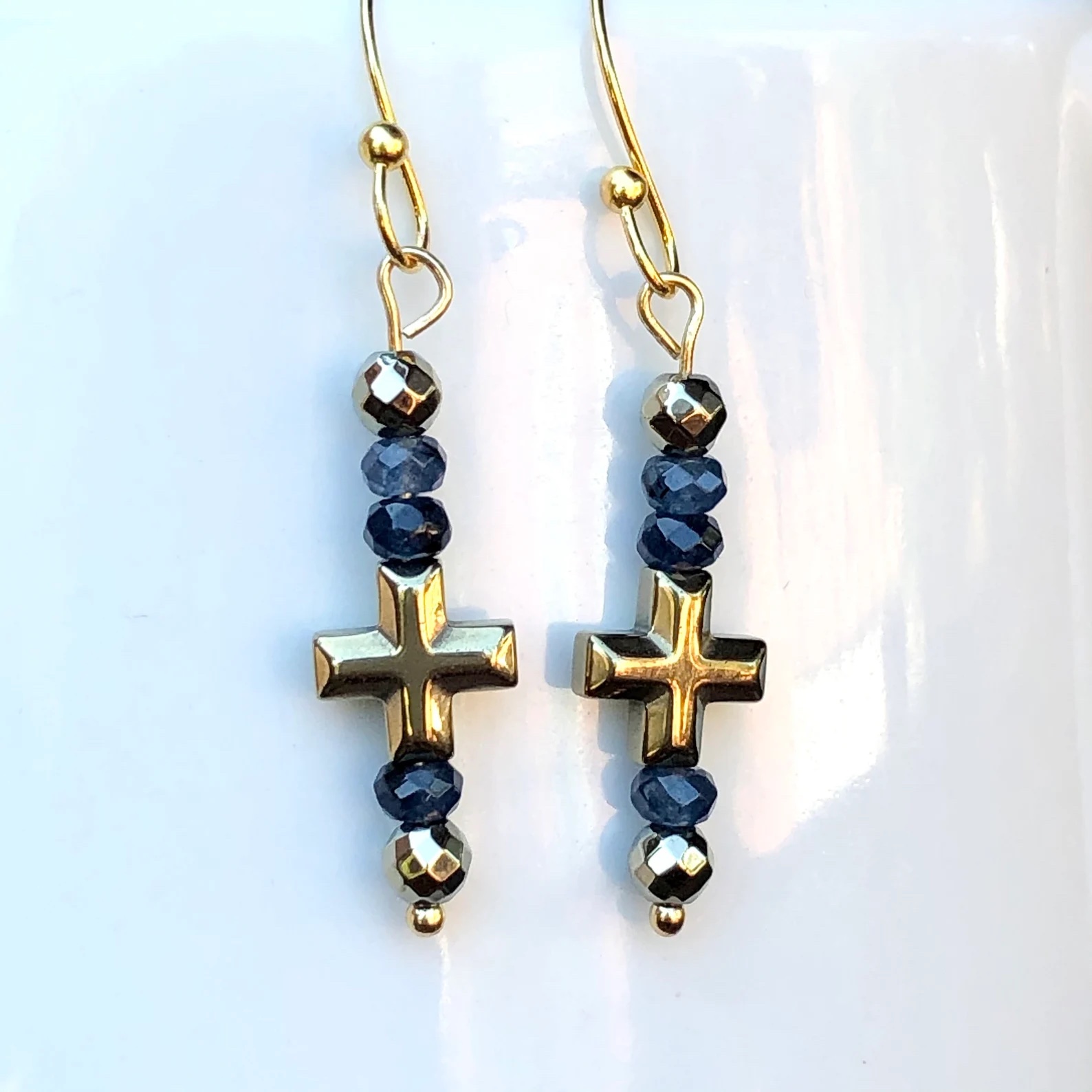 blue glass bead and cross earrings jewellery 
